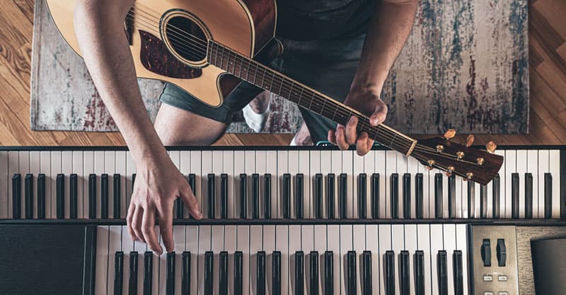 Piano or guitar which store is easier to learn